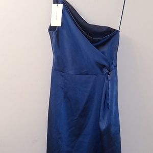 Dark Blue evening dress, 1 strap on the right and a slit on the left leg.
